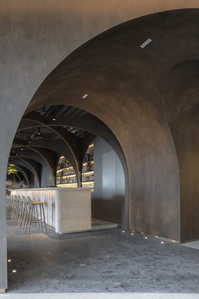 sequence of arches stimulates curiosity within MARS studio's restaurant in china