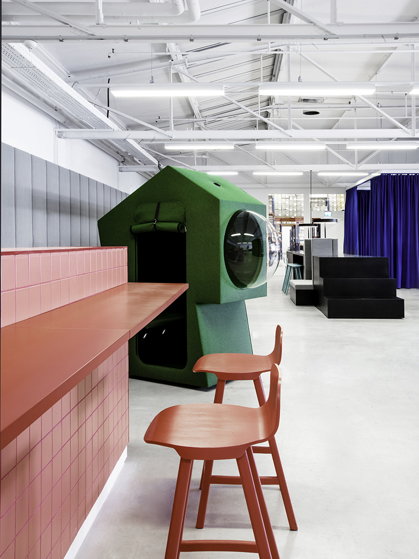 studio aisslinger inserts colorful work capsules into LOQI office in berlin designboom