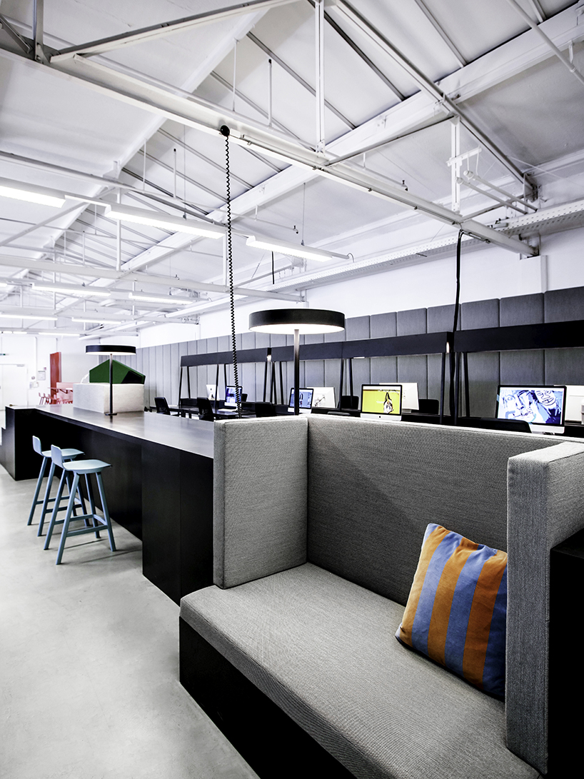 studio aisslinger inserts colorful work capsules into LOQI office in berlin designboom