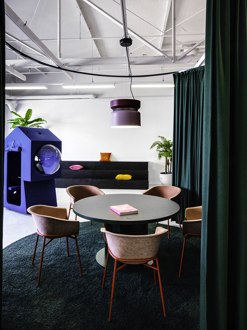 studio aisslinger inserts colorful work capsules into LOQI office in berlin designboom