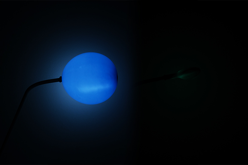 chaosteria's 'balloon lamp' slowly shrinks and dims like a disappearing star designboom