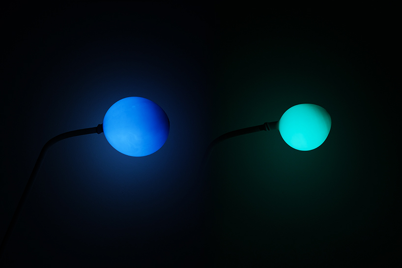 chaosteria's 'balloon lamp' slowly shrinks and dims like a disappearing star designboom