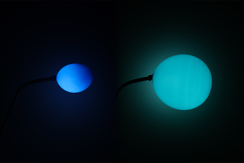 chaosteria's 'balloon lamp' slowly shrinks and dims like a disappearing star designboom