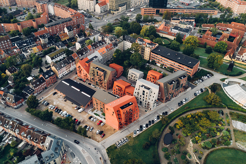 CEBRA designs a 'cozy cobbled streetscape' for aarhus apartments designboom