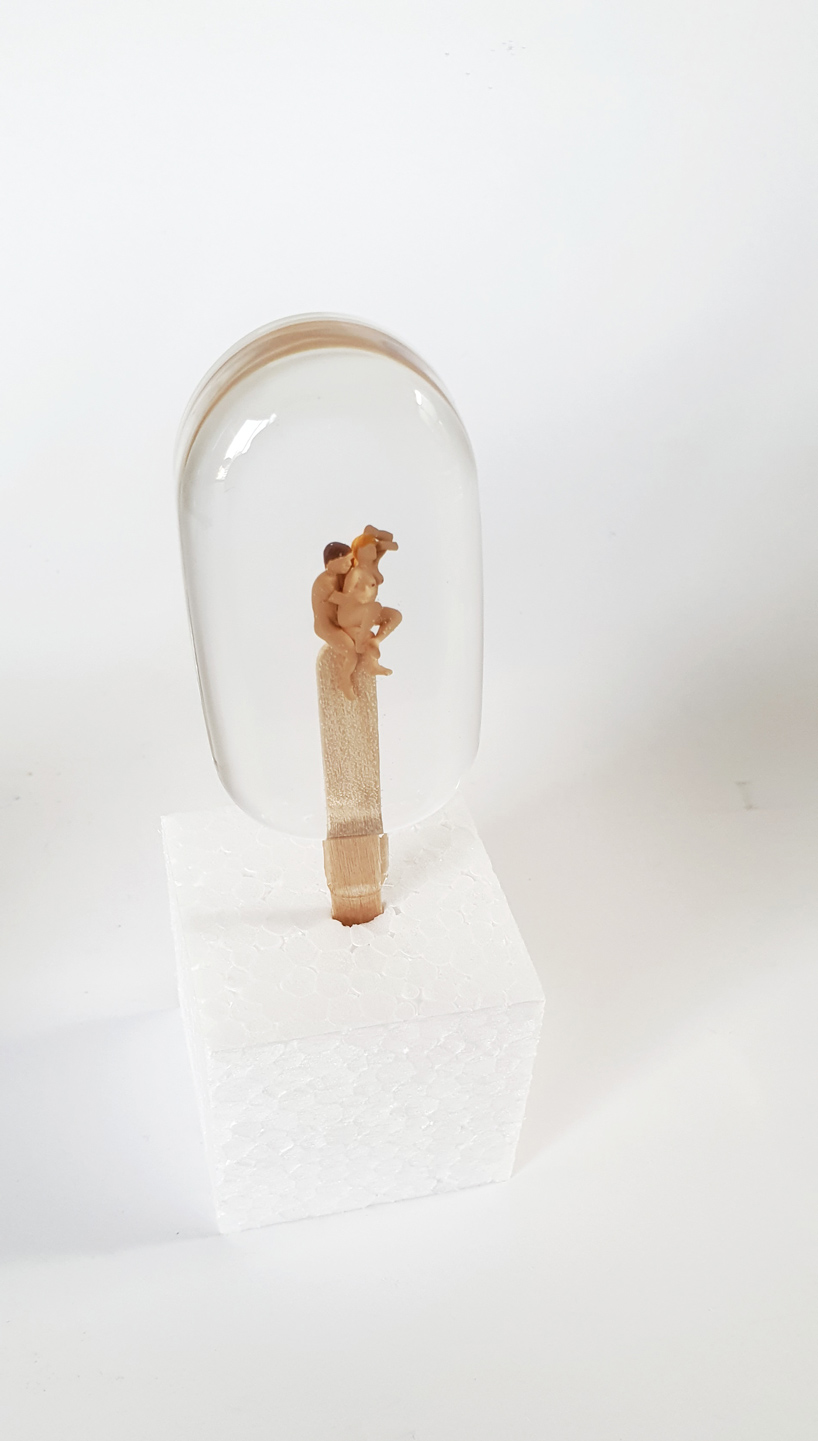 sophie meier encases naughty figurines in popsicle-shaped resin molds designboom