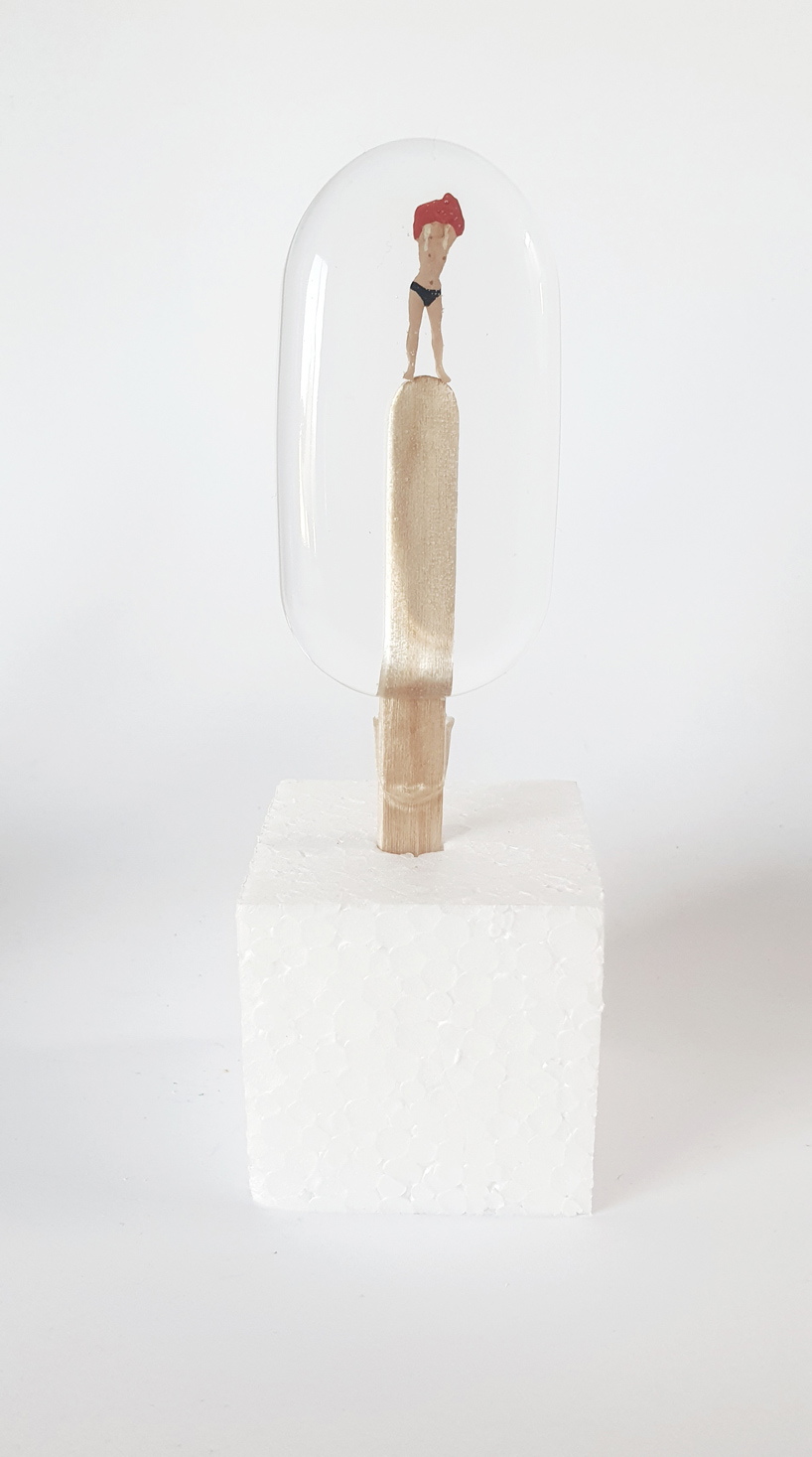 sophie meier encases naughty figurines in popsicle-shaped resin molds designboom