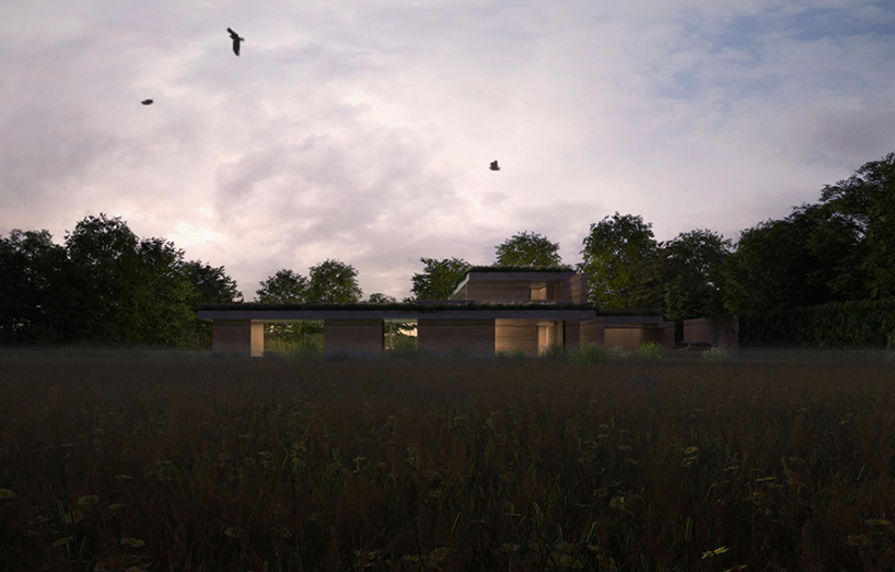 DHaus sculpts eco-friendly home in surrey's countryside from rammed earth 