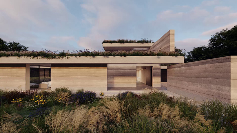 DHaus sculpts eco-friendly home in surrey's countryside from rammed earth 