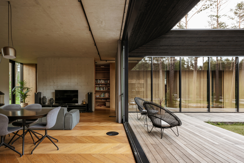 laaneotsa house by kuu arhitektid wraps around a cosy private garden 4