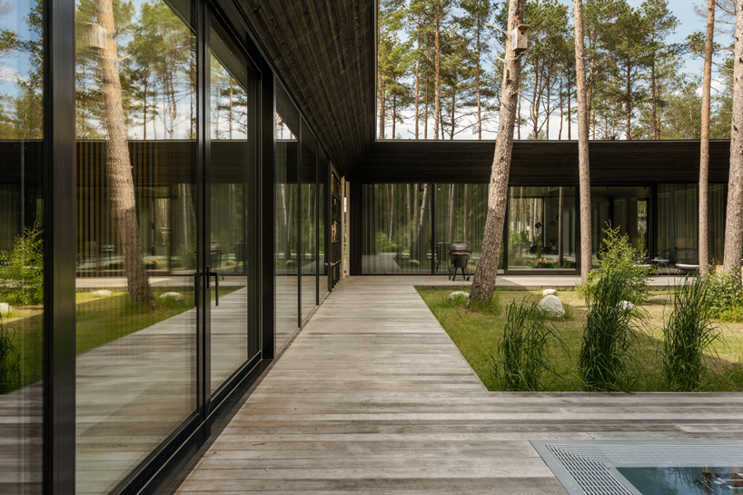 laaneotsa house by kuu arhitektid wraps around a cosy private garden 6