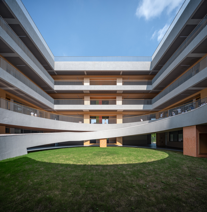 bright red striped patterns overlay fengpu elementary school's exterior in shanghai - 7