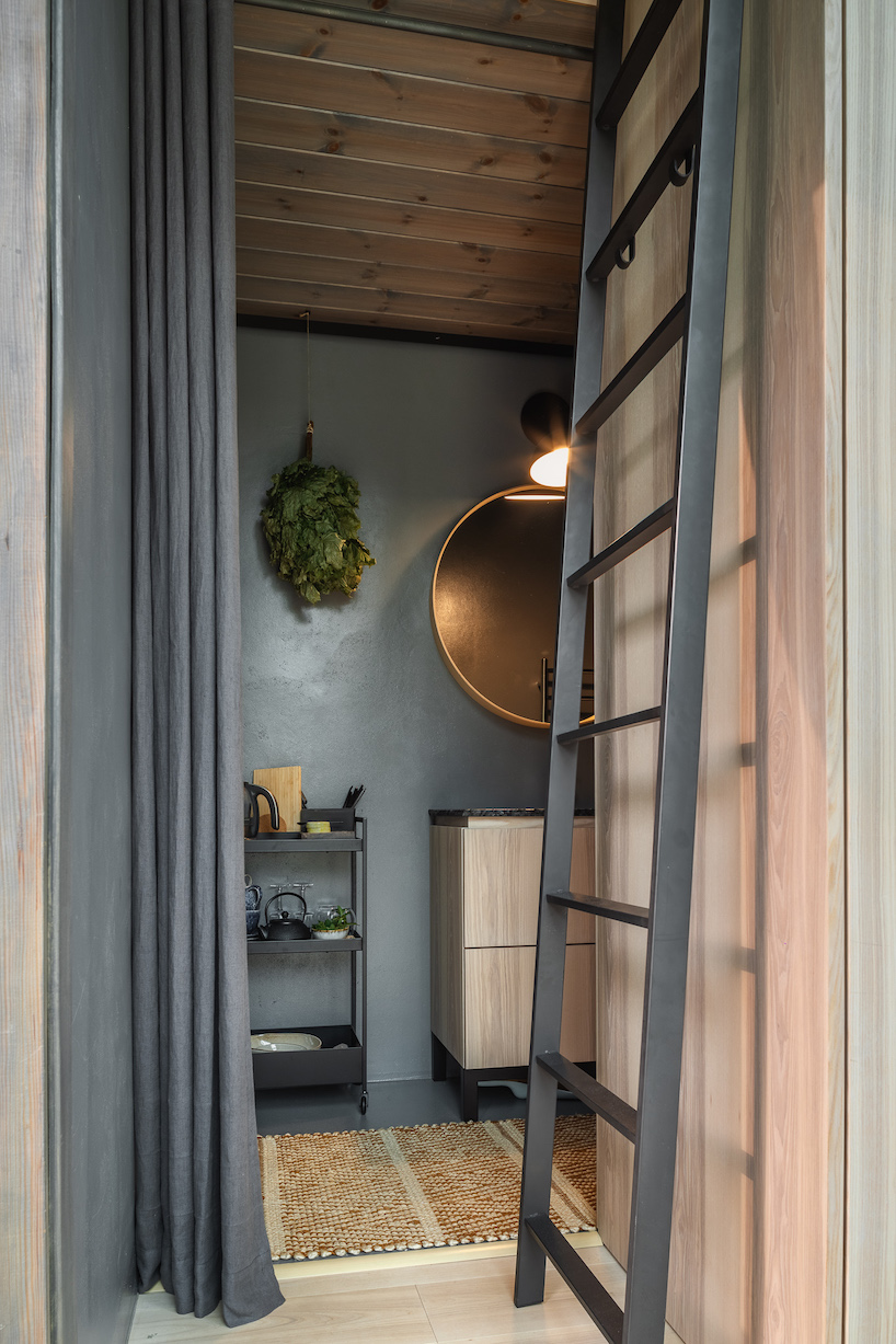 open AD designs three corten steel and glass cabins in rural latvia designboom