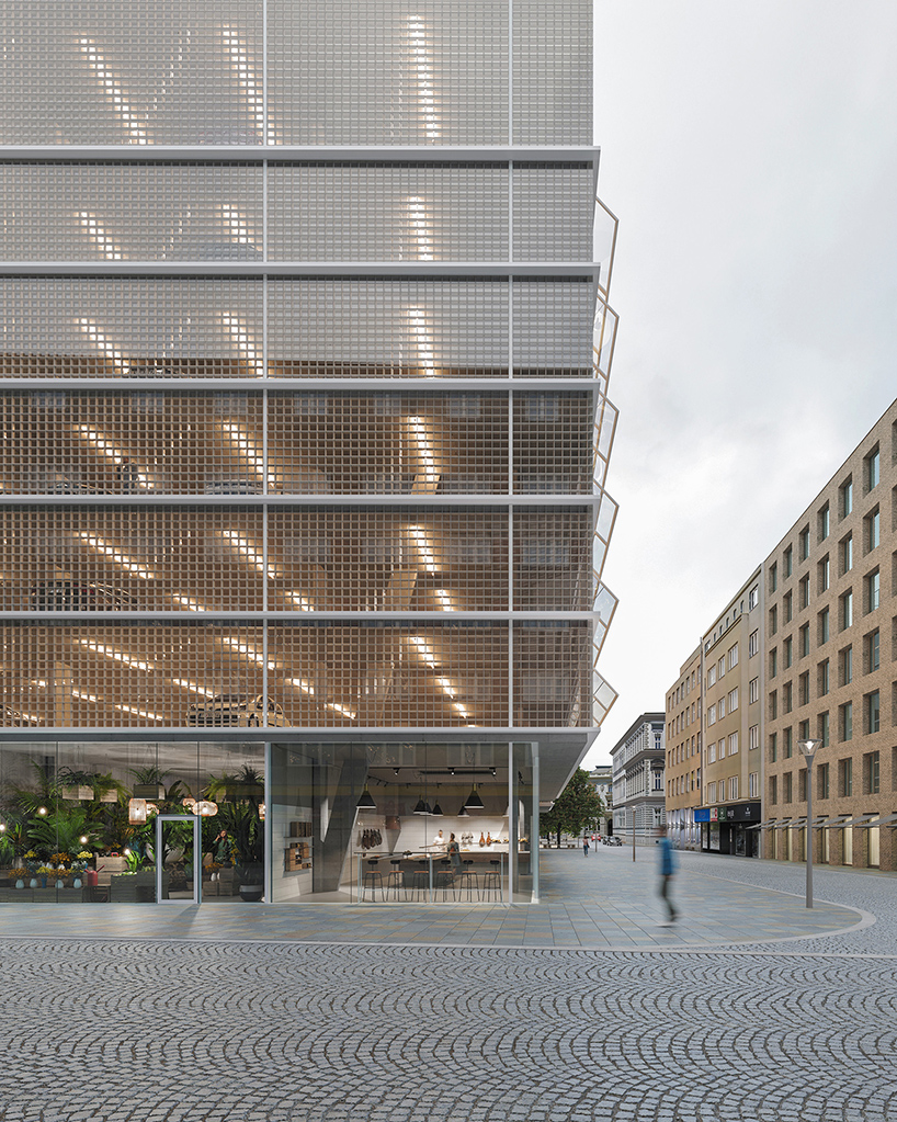 transparent grid façade completes parking house by malý chmel in czech republic