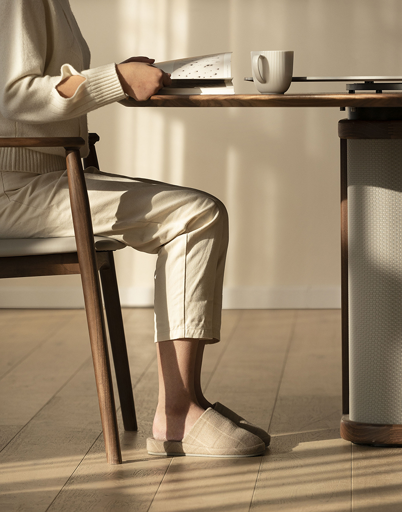 tian li designs round table inspired by ancient chinese proverb