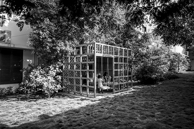 open door design studio nestles wooden experience for kids in a private garden in pakistan