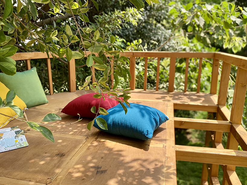 open door design studio nestles wooden experience for kids in a private garden in pakistan