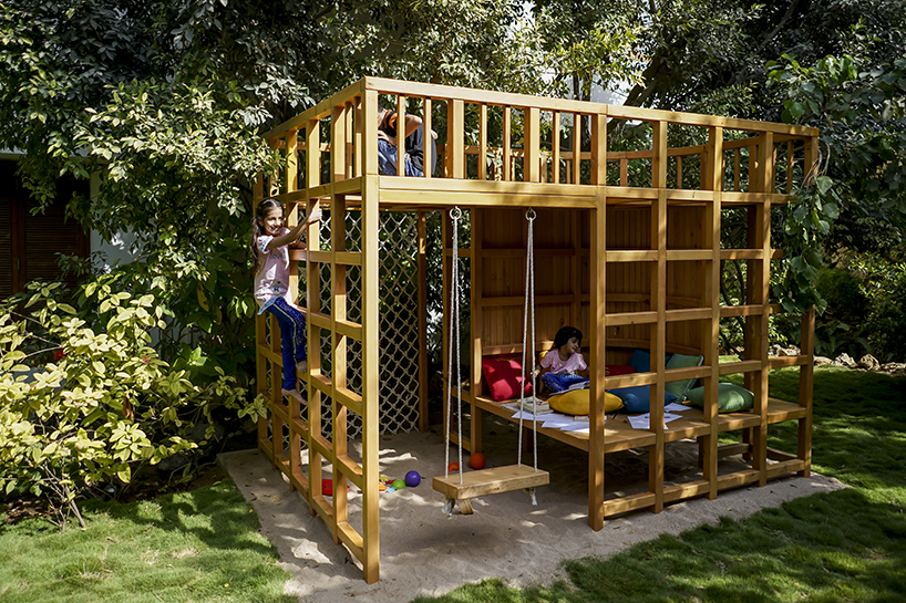 open door design studio nestles wooden experience for kids in a private garden in pakistan