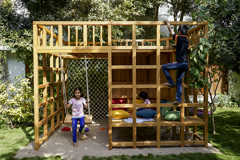 open door design studio nestles wooden experience for kids in a private garden in pakistan