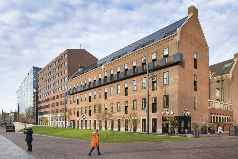 transformation of the former ptt building in rotterdam by orange architects 6
