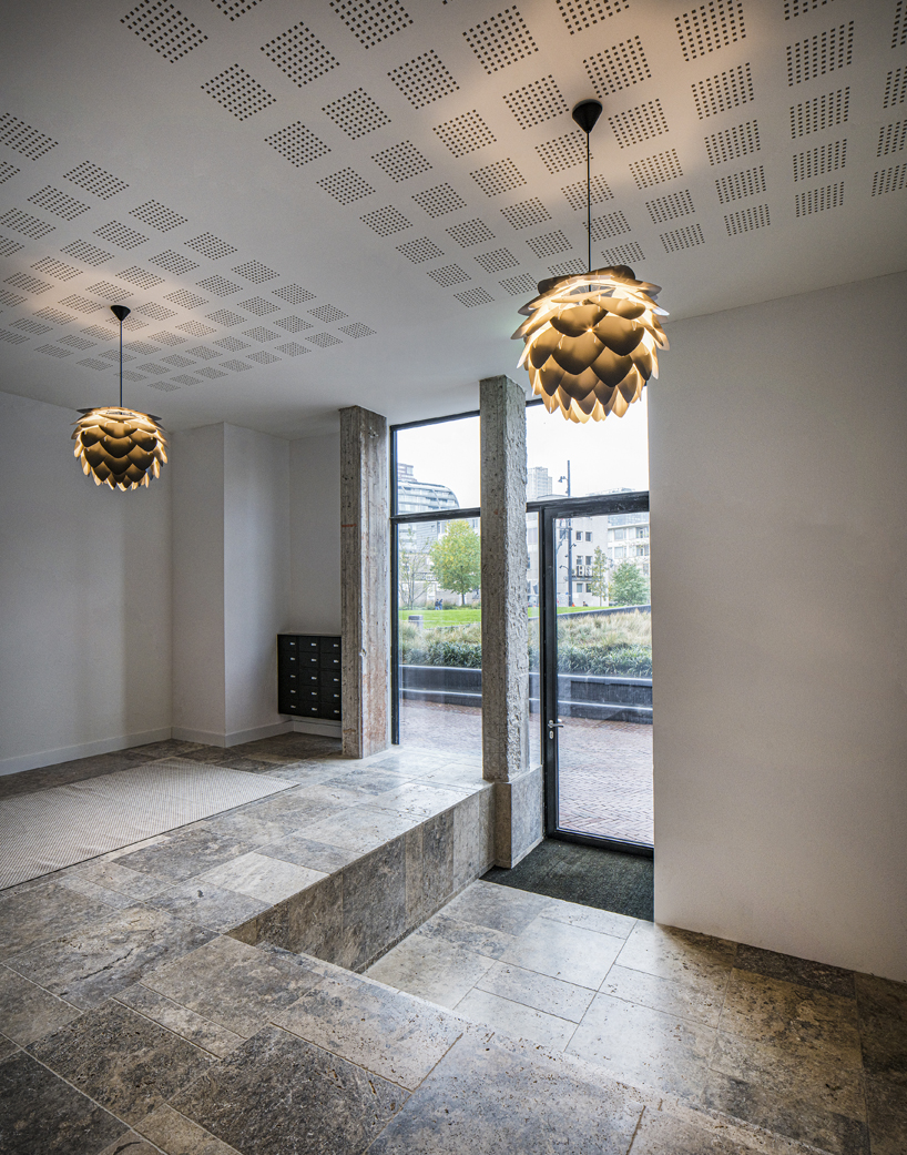 transformation of the former ptt building in rotterdam by orange architects 7