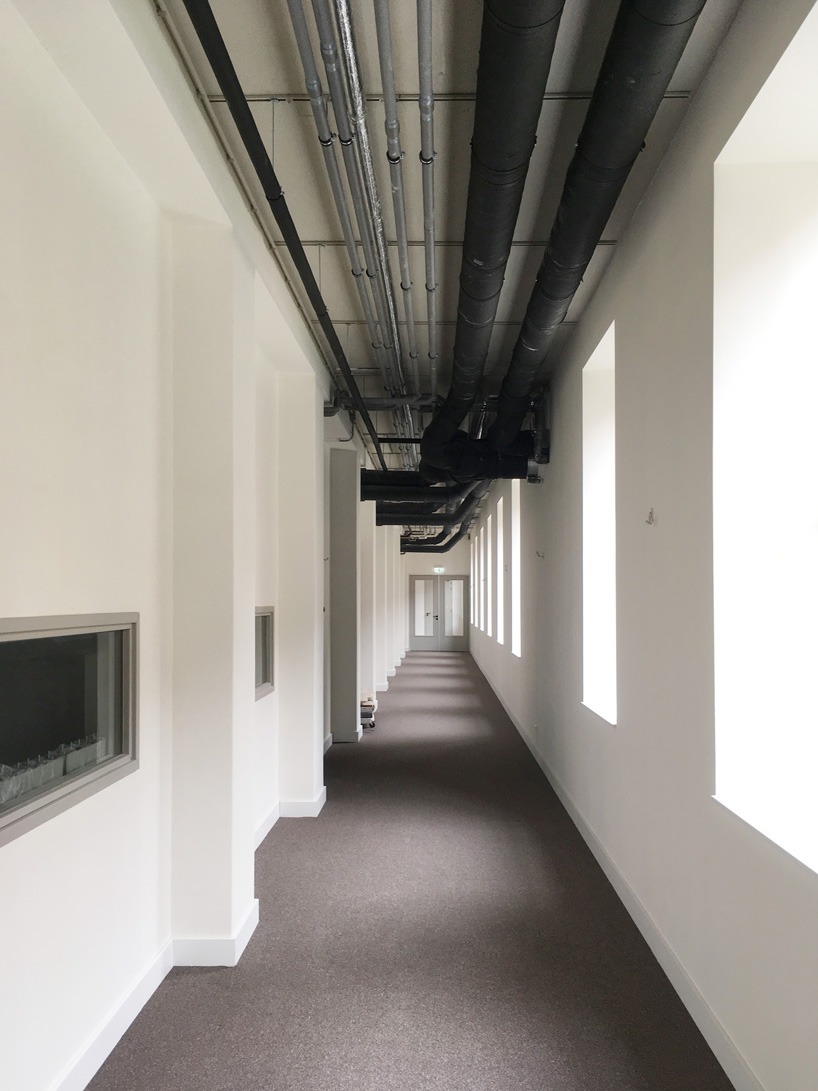 transformation of the former ptt building in rotterdam by orange architects 9