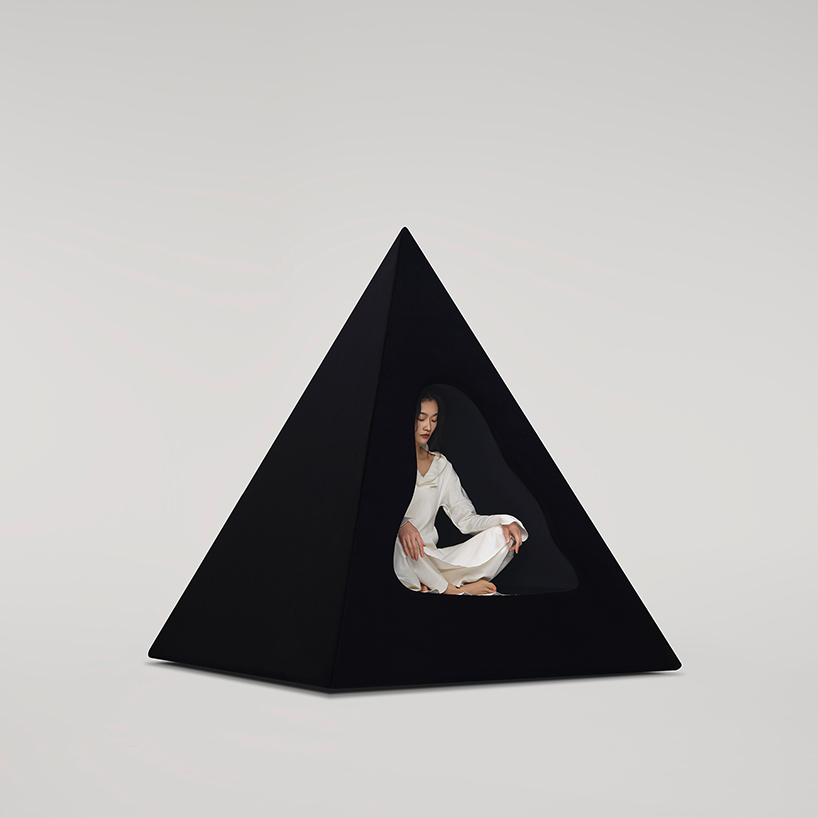 pyramidal cave chair by domain architects for bischiyano shapes retreat for secluded comfort - 2