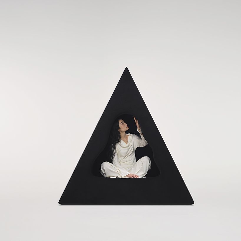 pyramidal cave chair by domain architects for bischiyano shapes retreat for secluded comfort - 3