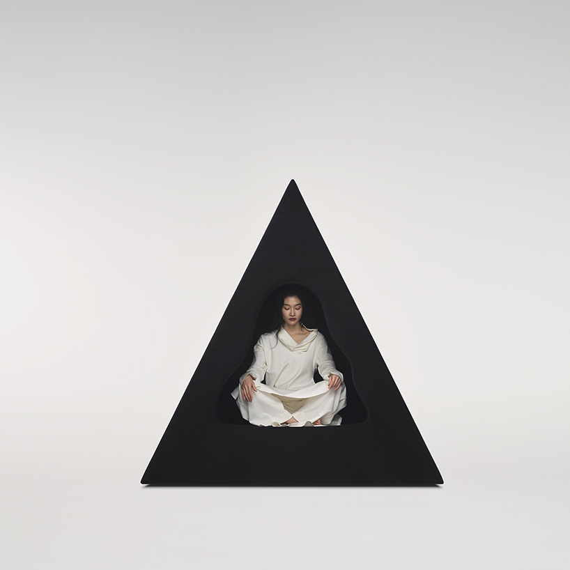 pyramidal cave chair by domain architects for bischiyano shapes retreat for secluded comfort - 1