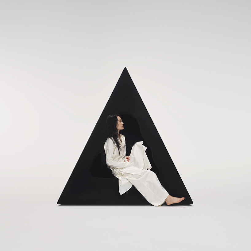 pyramidal cave chair by domain architects for bischiyano shapes retreat for secluded comfort - 4