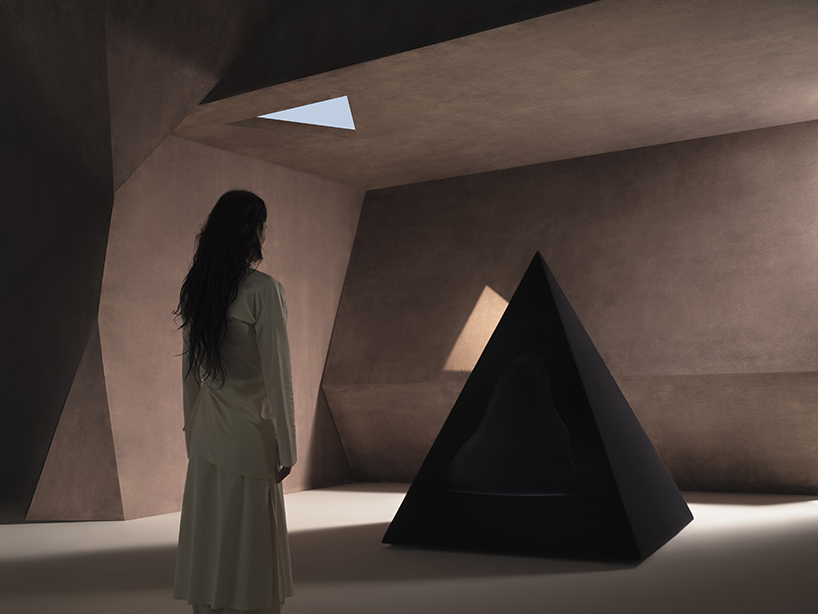 pyramidal cave chair by domain architects for bischiyano shapes retreat for secluded comfort - 6