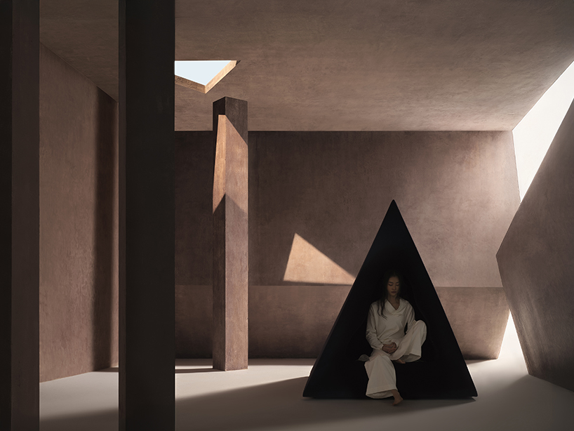 pyramidal cave chair by domain architects for bischiyano shapes retreat for secluded comfort - 7