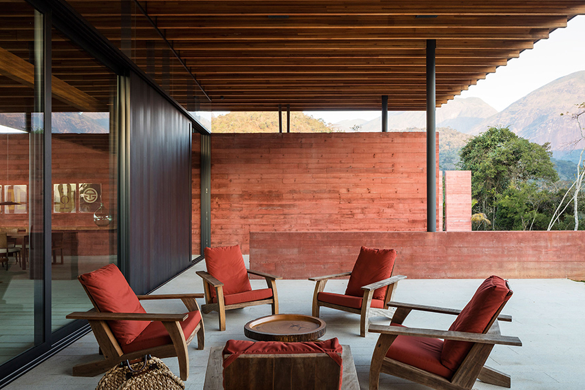 terracotta tinted walls adorn this hilltop weekend home in brazil by bernardes arquitetura 