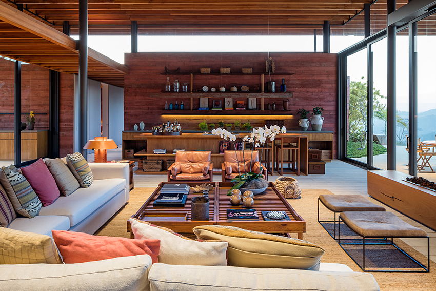 terracotta tinted walls adorn this hilltop weekend home in brazil by bernardes arquitetura 
