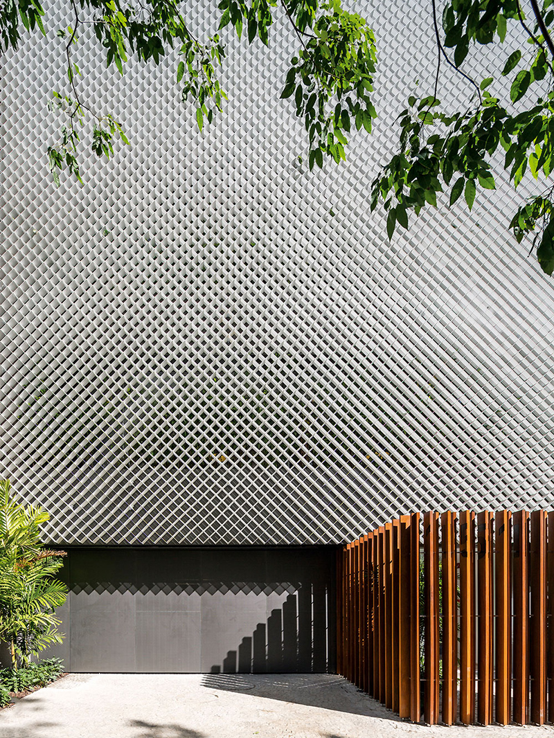 perforated metal façade decorates bernardes arquitetura's office block in brazil