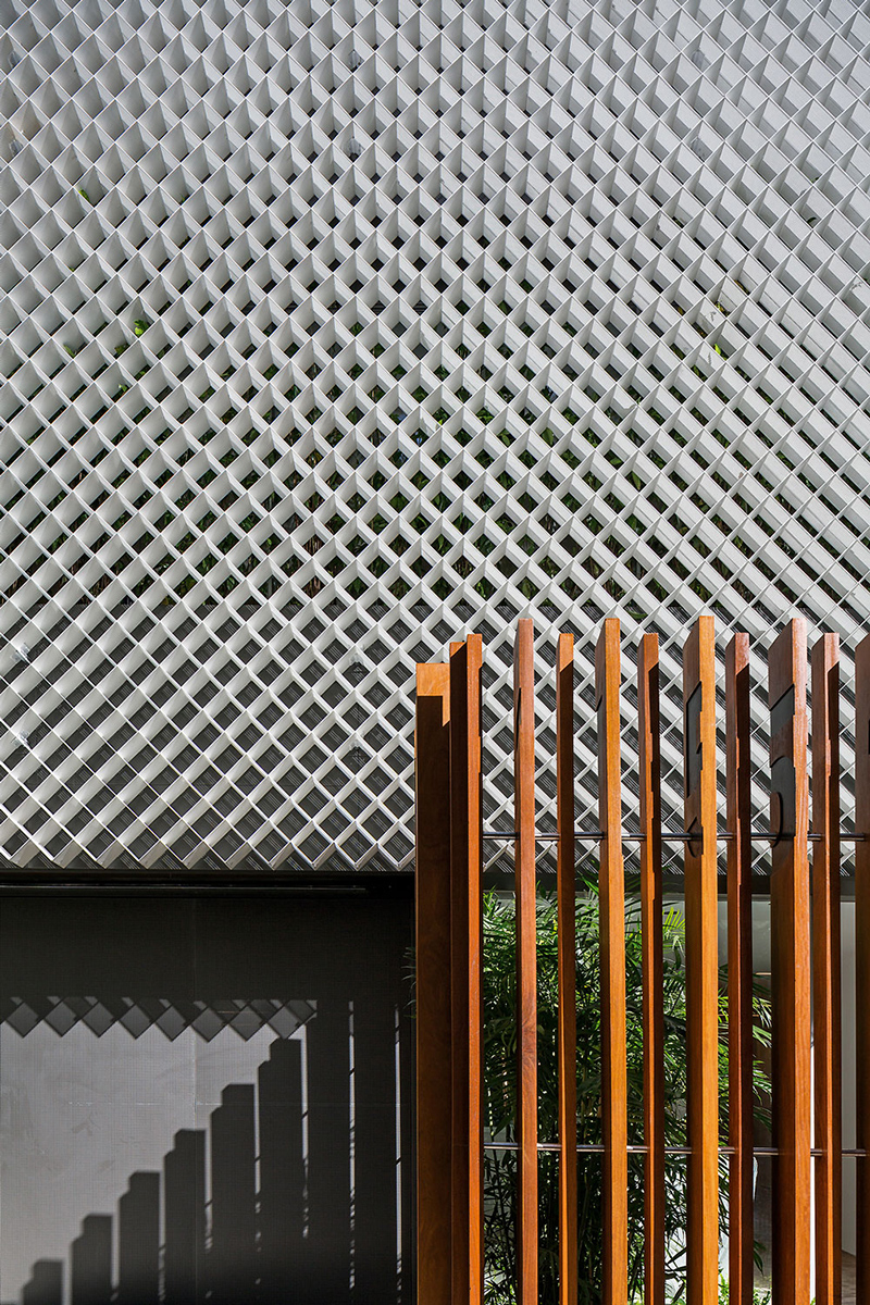 perforated metal façade decorates bernardes arquitetura's office block in brazil