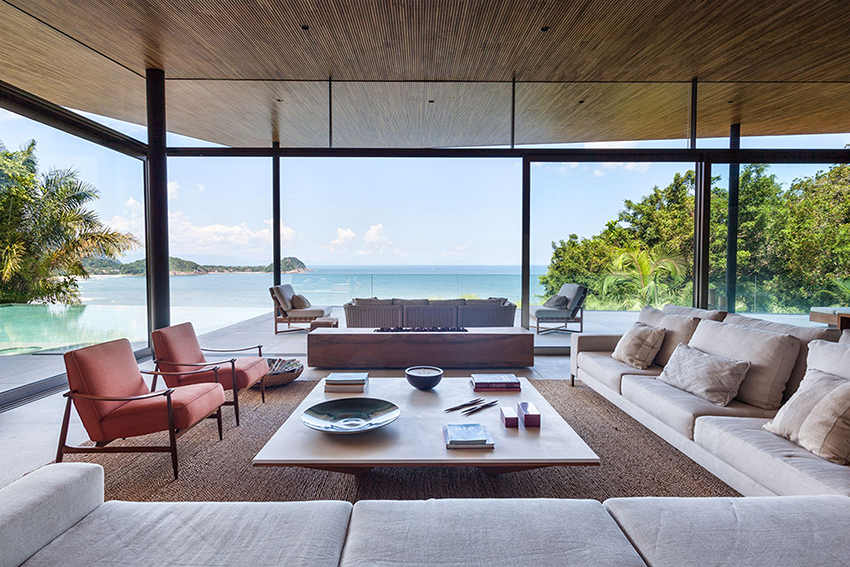 timber lattice with pivoting windows clads 'delta house' by bernardes arquitetura in brazil