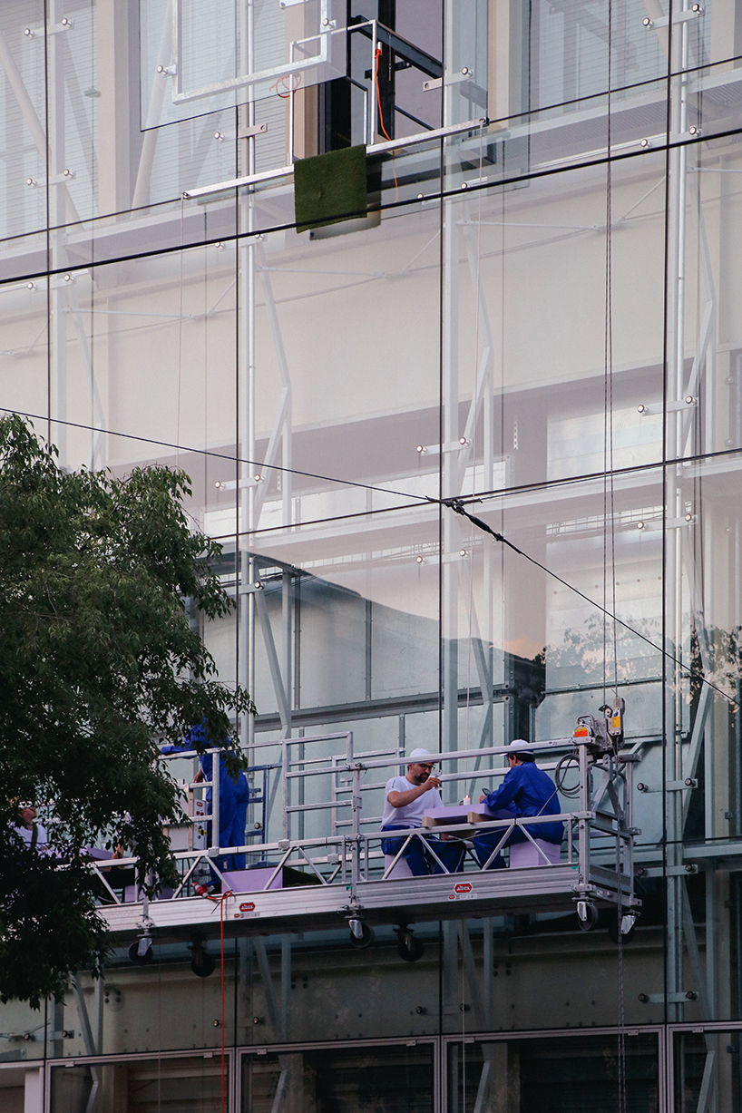 city and architecture are reconciled with installation by maciver-ek chevroulet that perforates messe basel façade