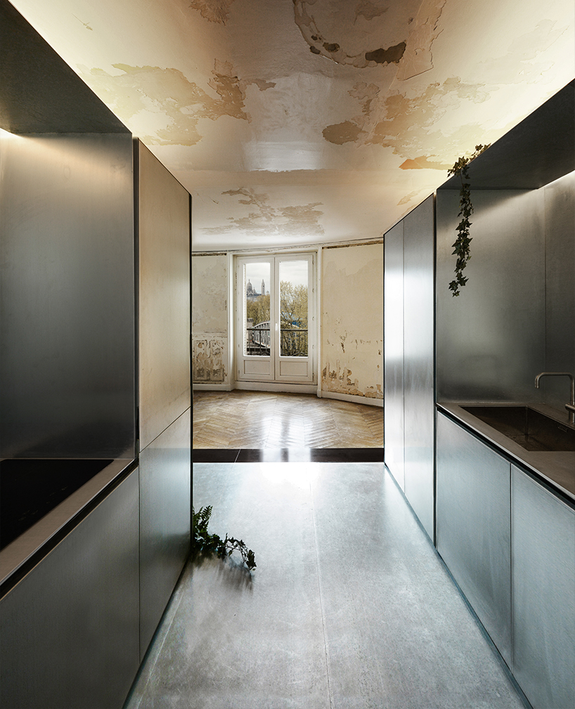 theo c. domini abstracts steel and faded plaster for this 19th-century parisian apartment