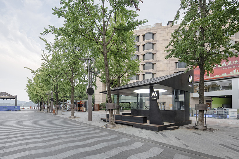 triangular volumes characterize this café pavilion in hangzhou, china 