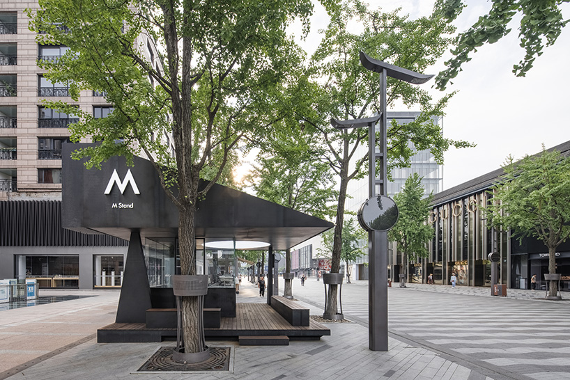 triangular volumes characterize this café pavilion in hangzhou, china 