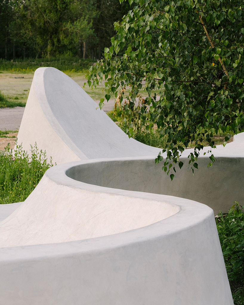 wavy concrete strips stretch along french industrial site to form 'skatepark continua'