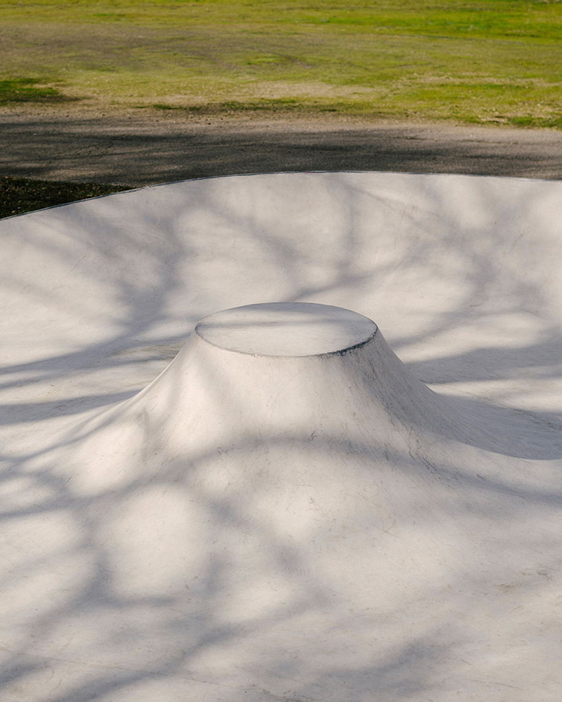wavy concrete strips stretch along french industrial site to form 'skatepark continua'