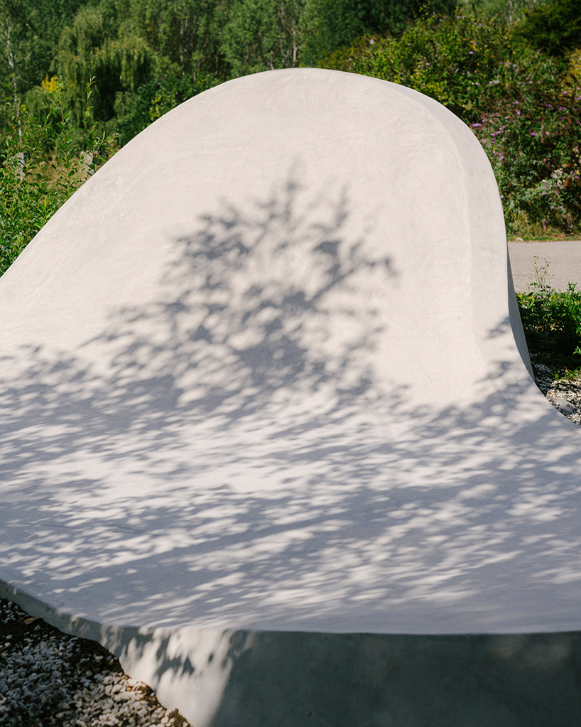 wavy concrete strips stretch along french industrial site to form 'skatepark continua'