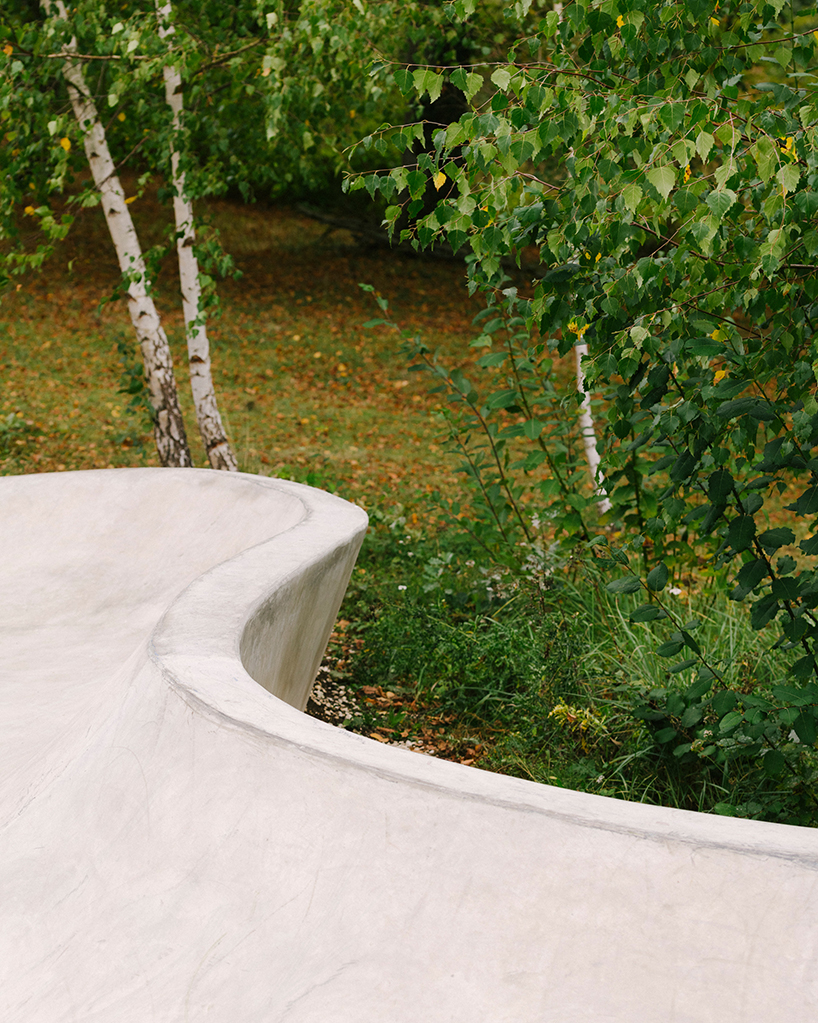 wavy concrete strips stretch along french industrial site to form 'skatepark continua'