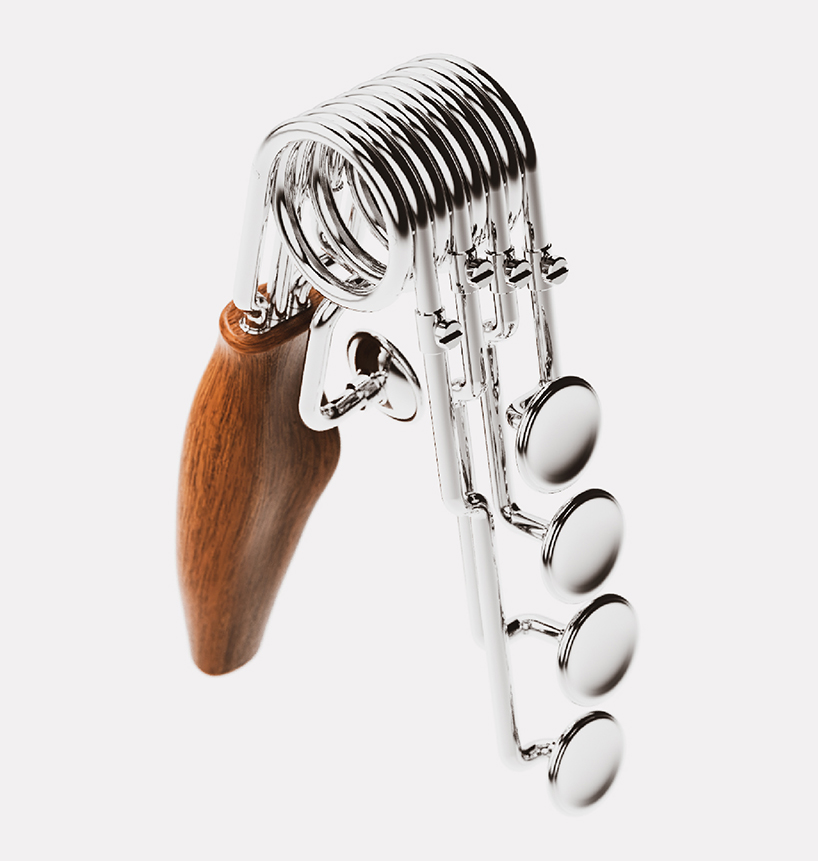 two yahamas, one passion sculpts a hand gripper that can be manipulated like a saxophone