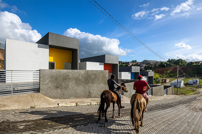 clean geometries and bright pops of color characterize social housing by NEBR arquitetura in brazil
