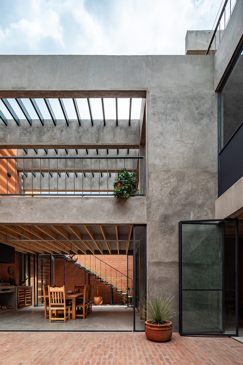 well-lit central patio blurs the boundaries within 'nuestro sueño' house in mexico