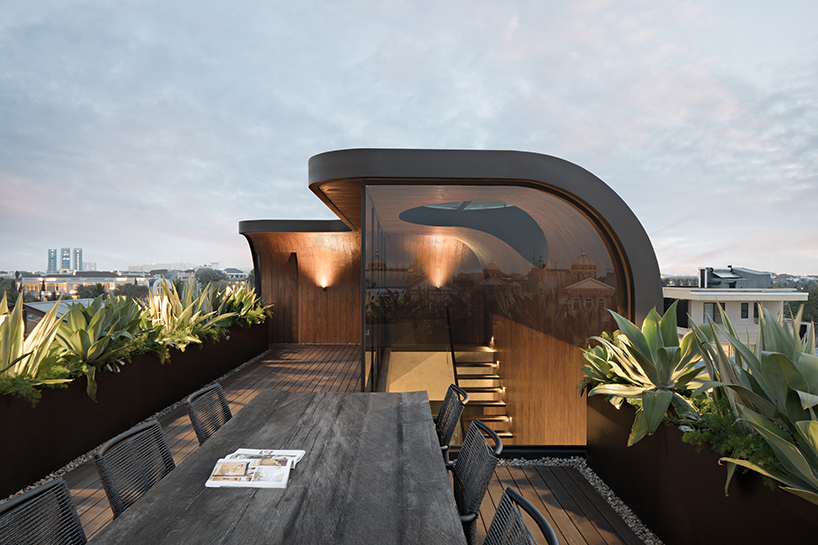 k thengono punctures holes from above to maintain well lit interior for a small tech start up office 1