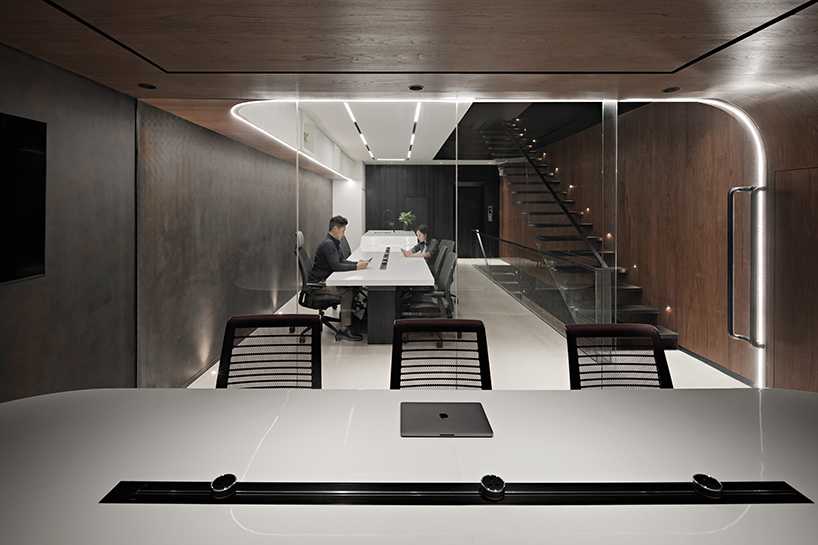 k thengono punctures holes from above to maintain well lit interior for a small tech start up office 10