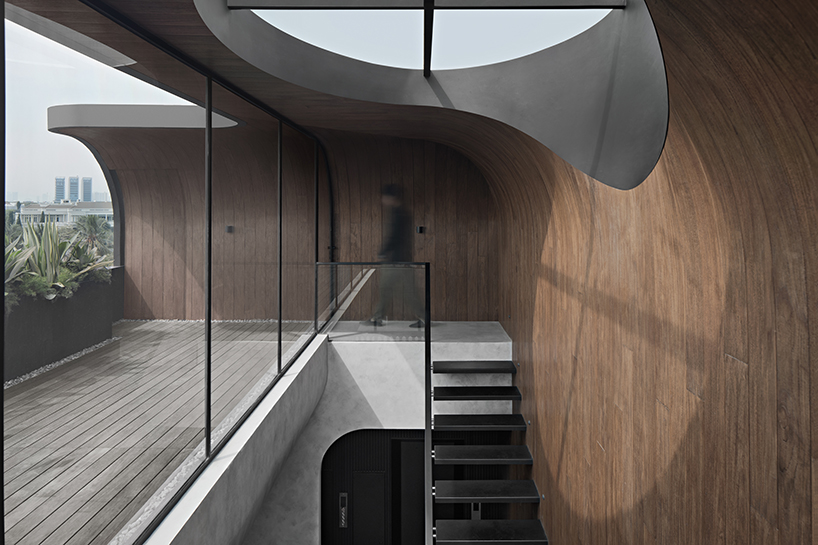 k thengono punctures holes from above to maintain well lit interior for a small tech start up office 2